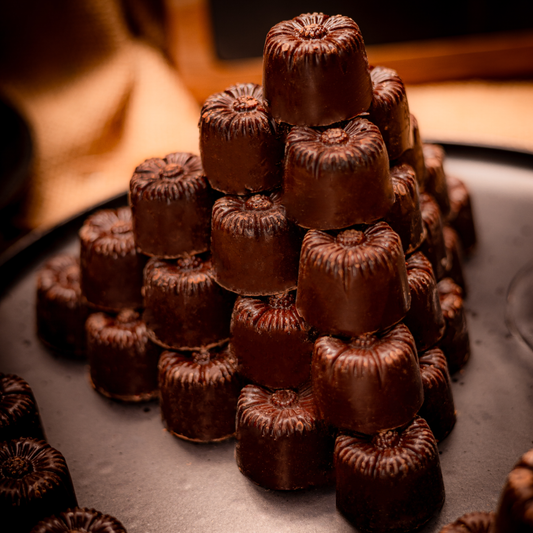 1 kg de praline din ciocolată neagră umplute cu lichior de ouă