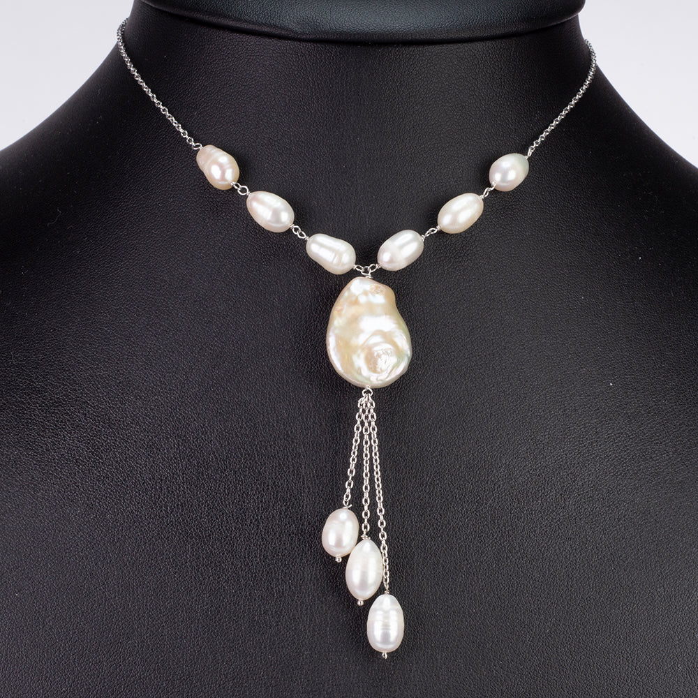 Set din Argint 925 ( 3.92 grame ) cu Perlă de Cultură Baroc Clasa ”AAA” și Perlă de Cultură Akoya 73.55 Carate ( Colier+Cercei )
